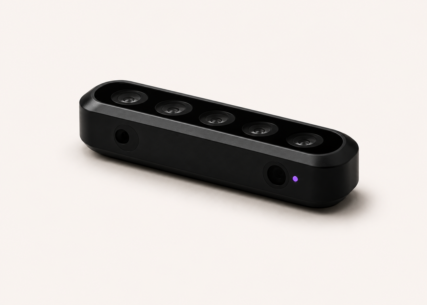 Free Clicker motion bar — elongated matte black bar with five recessed motion sensors