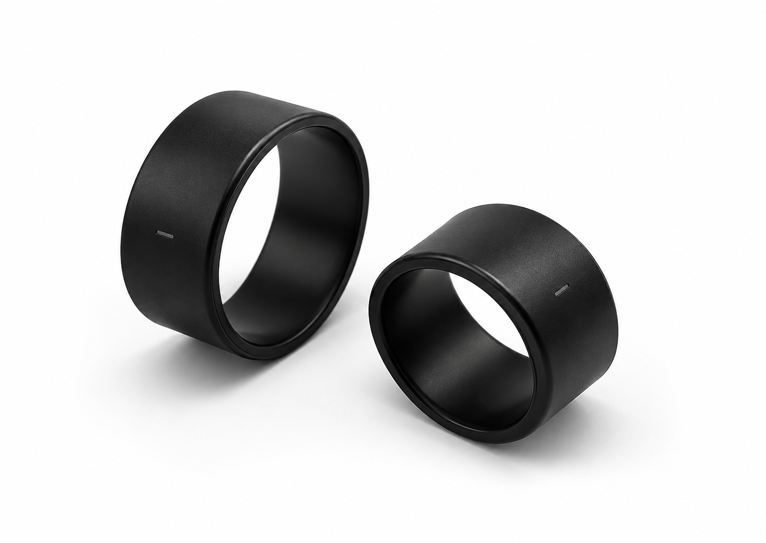 Free Clicker wristband sensors — two matte black rings